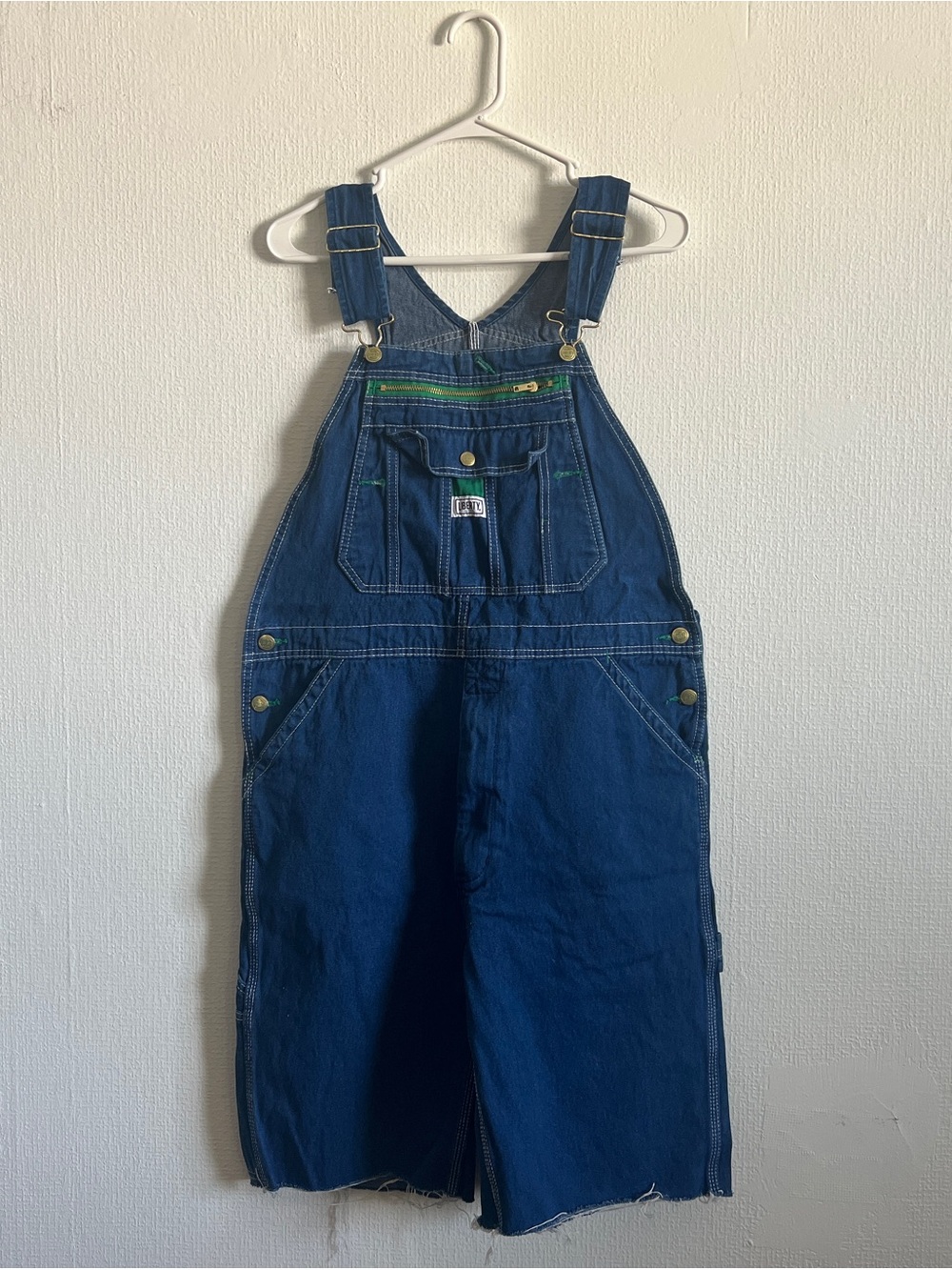 liberty overalls, short cutoffs with raw frayed edge